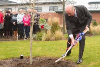 General the Lord Dannatt planting trees at Chavasse VC House