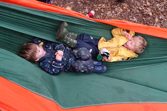 Two tots in hammock