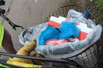 A bucket full of plastic rubbish collected during Spring Pickers 2024