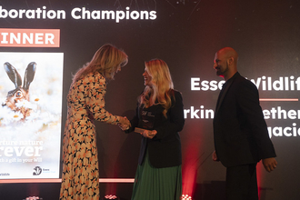 Lizzy, Philanthropy Manager, receiving award at Smee and Ford Legacy Giving Awards 2025