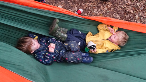 Two tots in hammock